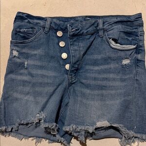High-Rise Distressed Denim Shorts in Dark Blue